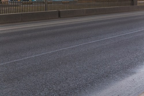 Ремонт асфальтобетонного покрытия на искусственных дорожных сооружениях Санкт-Петербурга – фото 25 из 36